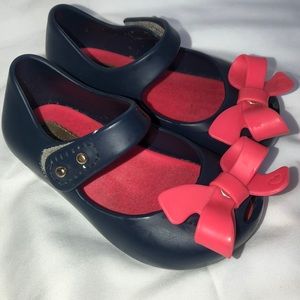 Navy with neon pink bow